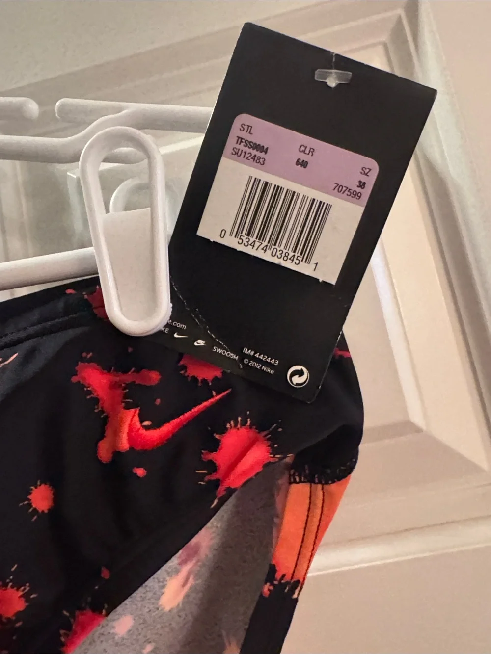 Nike Men’s Black Swim Briefs with Red and Orange Splatter Size 38.